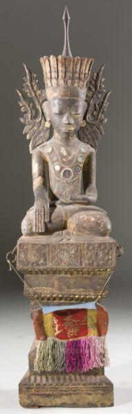 Appraisal: Antique Burmese Seated Wooden Buddha of localized style a polychrome