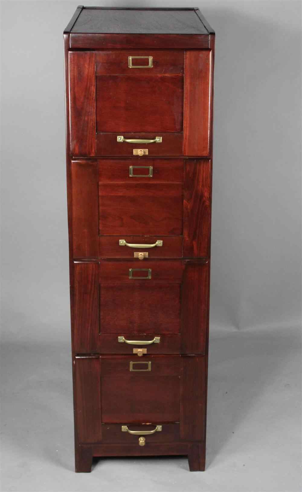 Appraisal: TALL STAINED WOOD FILE CABINET four drawers with brass trim