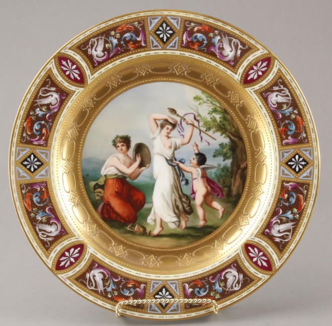 Appraisal: Charger depicts figures dancing with tambourine and putti in landscape