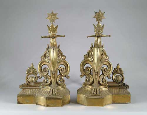 Appraisal: PAIR OF BRASS DECORATIVE ANDIRONS Dragon head tops with star