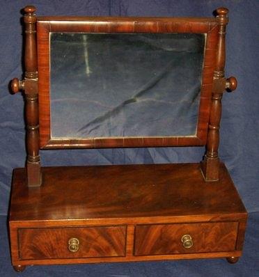 Appraisal: A th Century mahogany framed box mirror the rectangular glass