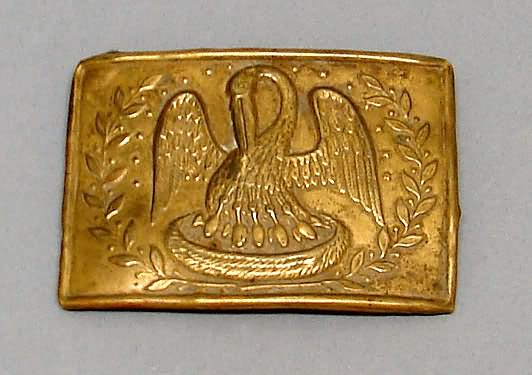 Appraisal: Lead filled brass belt plate featuring pelican and young Louisiana