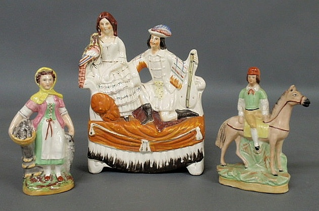 Appraisal: Three Staffordshire pieces- fisherwoman c h figural group of a