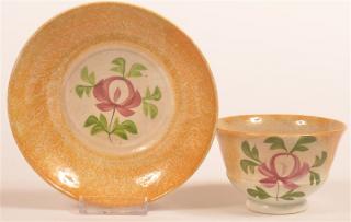 Appraisal: Yellow Spatter Adams Rose Cup and Saucer Yellow Spatter China