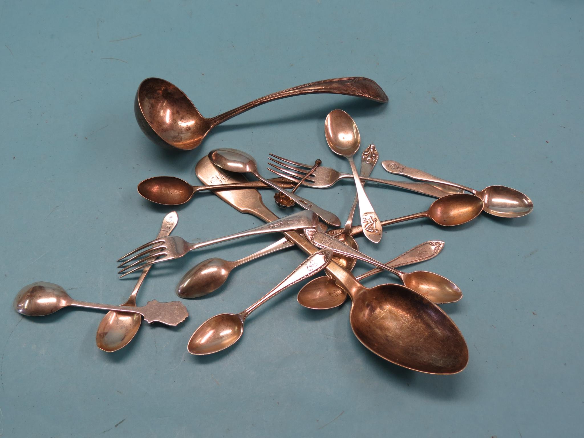 Appraisal: A small assortment of silver flatware including early Victorian fiddle-pattern