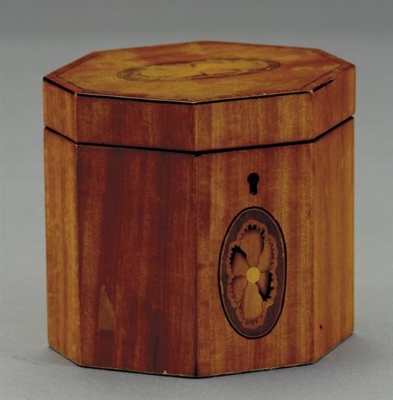 Appraisal: English inlaid mahogany octagonal tea caddy lid lifts to reveal