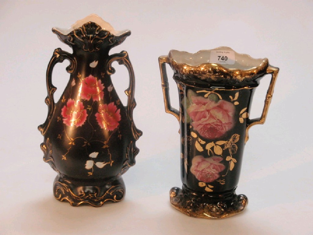 Appraisal: Two Falcon ware black ground rose decorated vases