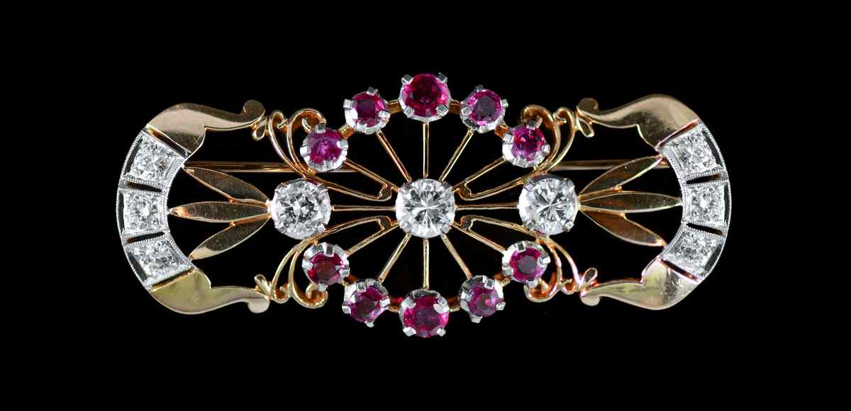 Appraisal: ART DECO DIAMOND AND RUBY BROOCH K and K yellow