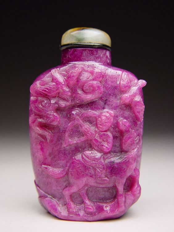 Appraisal: CARVED RUBY SNUFF BOTTLE Rare and finely carved natural ruby