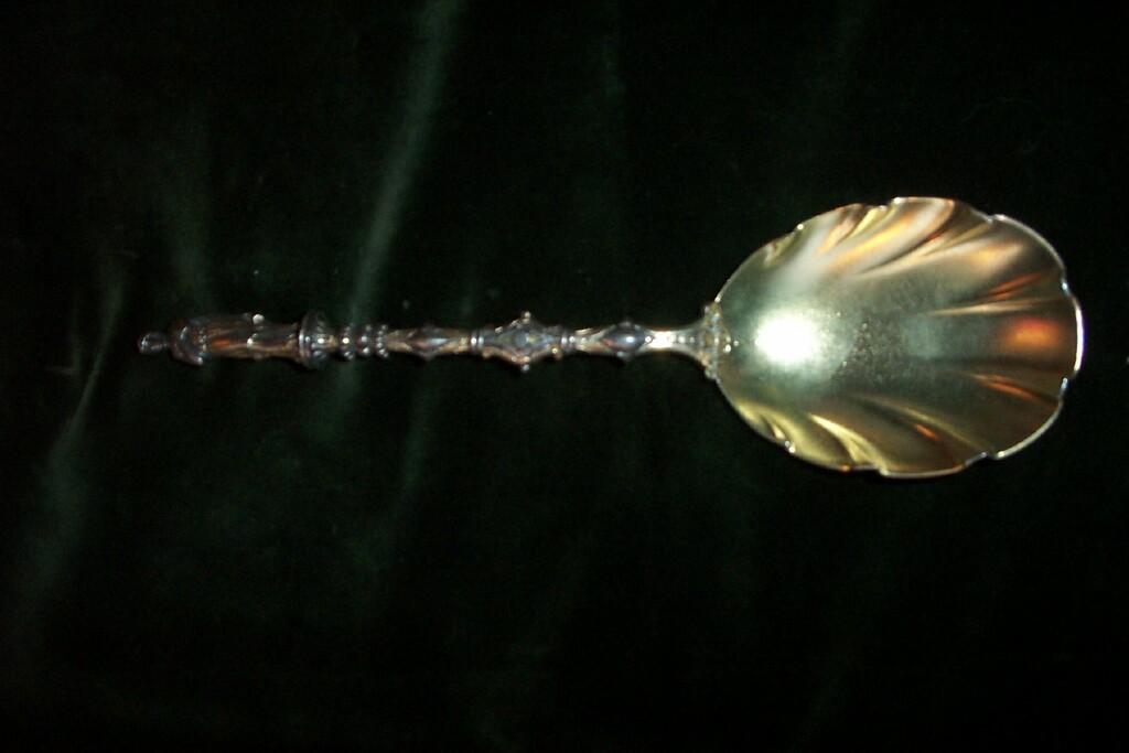 Appraisal: A set of outsized silver spoons with apostle finials shell