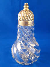 Appraisal: A late Victorian silver mounted swirl glass sugar sifter the