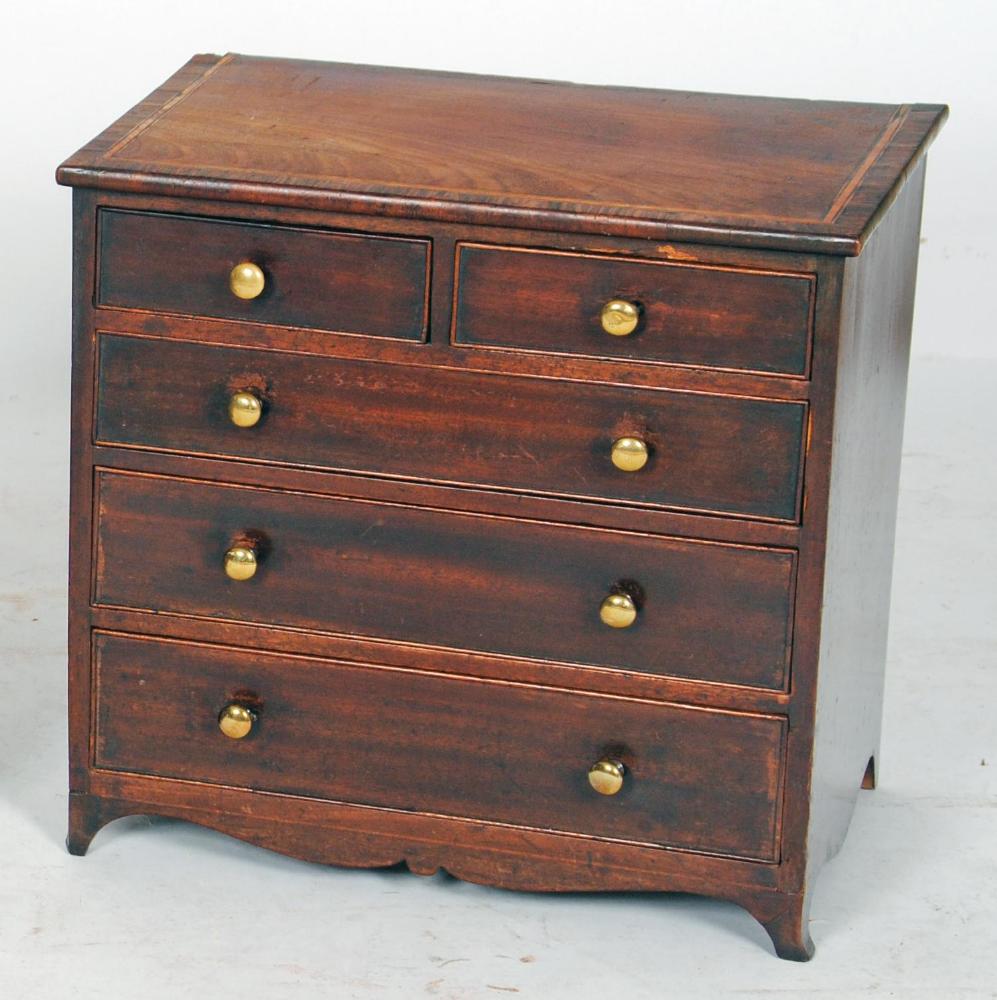 Appraisal: A GEORGE III MAHOGANY MINIATURE CHEST c the moulded edged