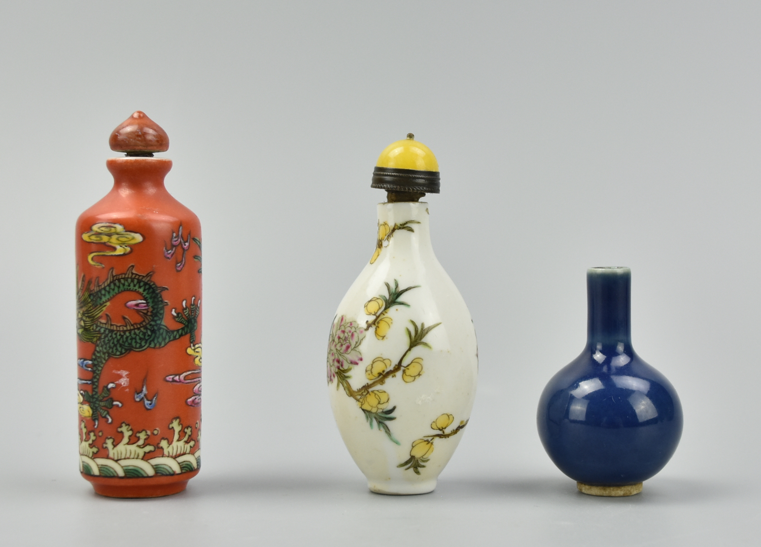 Appraisal: CHINESE PORCELAIN SNUFF BOTTLES TH C Chinese porcelain snuff bottles