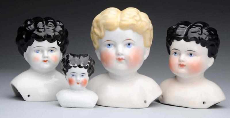 Appraisal: Lot of German China Doll Heads All are unmarked Lovely