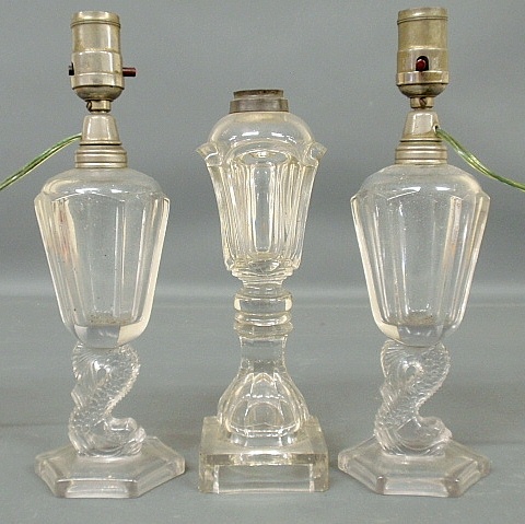 Appraisal: - Pair of clear glass oil lamps th c with