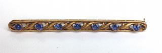 Appraisal: k y g bar pin having round cut bezel set