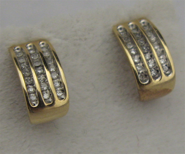 Appraisal: PAIR OF DIAMOND AND KARAT GOLD EARRINGS each is set