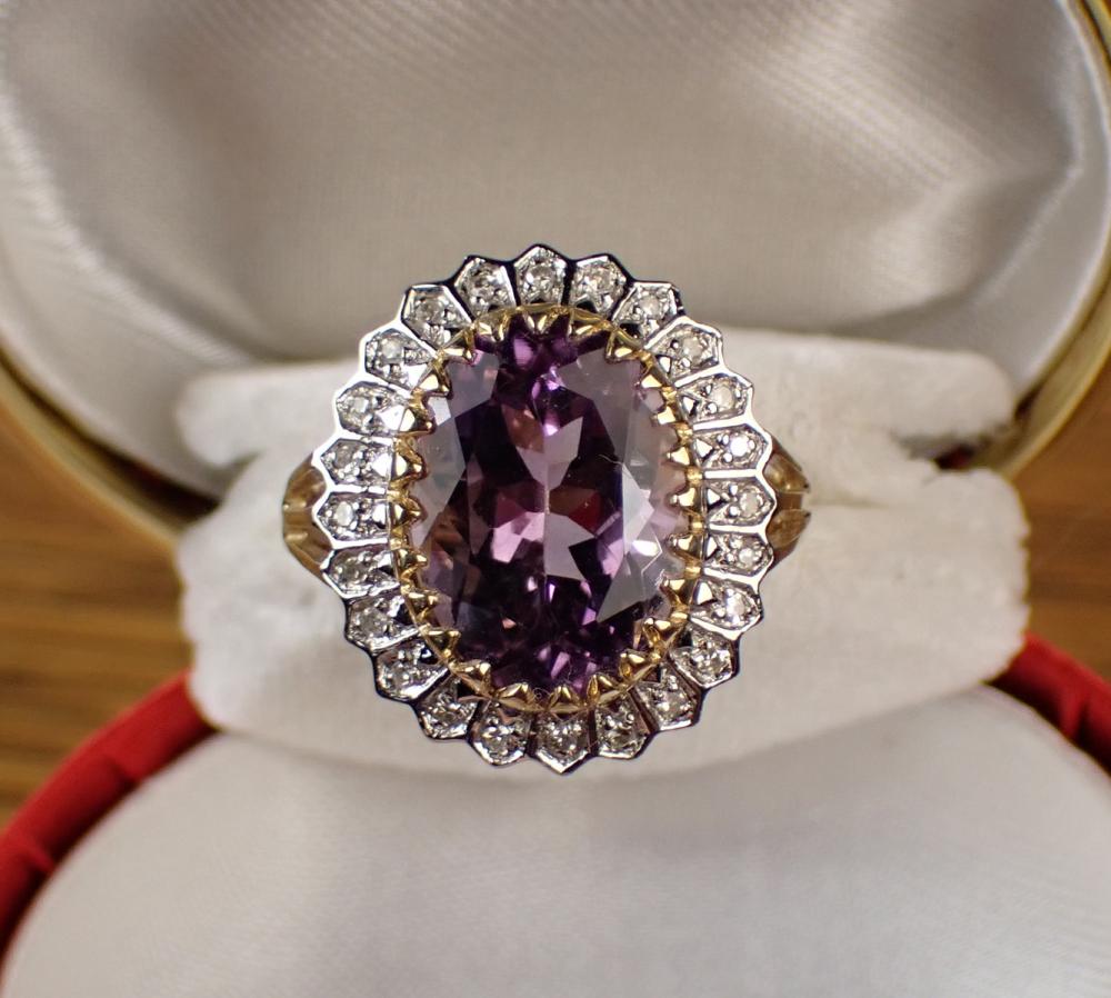 Appraisal: AMETHYST DIAMOND AND FOURTEEN KARAT GOLD RING The k yellow