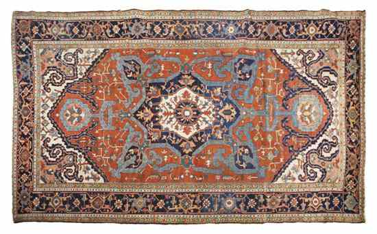 Appraisal: A Persian Wool Heriz Carpet having central geometric decoration set