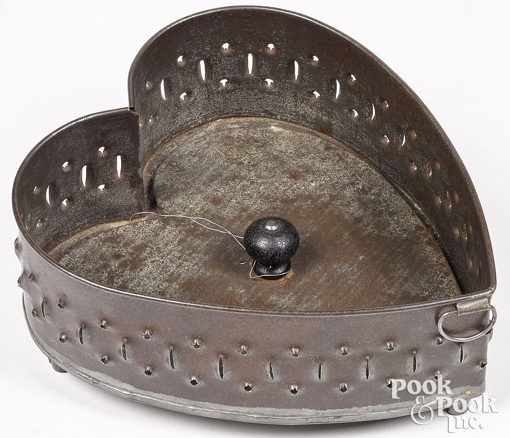 Appraisal: Pennsylvania punched tin heart cheese strainer Pennsylvania punched tin heart