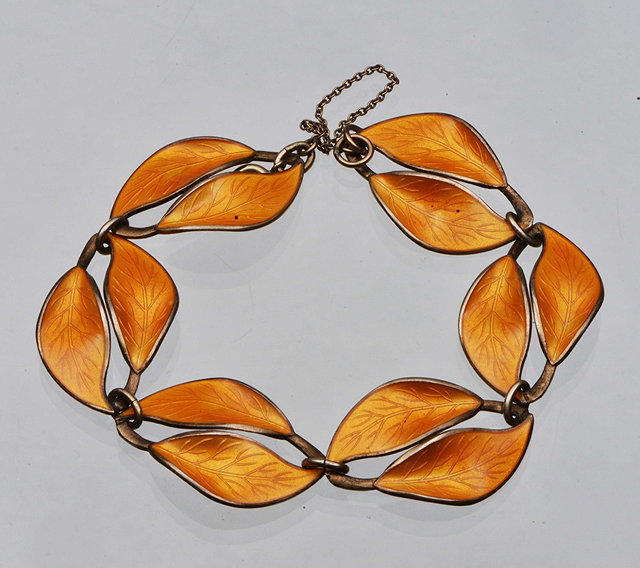 Appraisal: A SCANDANAVIAN SILVER AND ENAMEL DOUBLE LEAF LINKED PANEL BRACELET