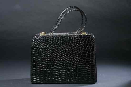 Appraisal: VINTAGE CYCLAX OF LONDON POLISHED BLACK ALLIGATOR COSMETICS BAG s