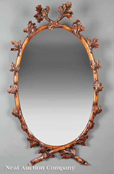 Appraisal: An Antique Leaf and Branch-Carved Oval Mirror Italian or French