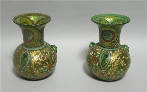 Appraisal: PAIR OF INDIAN ENAMELED GLASS VASES The green glass vases