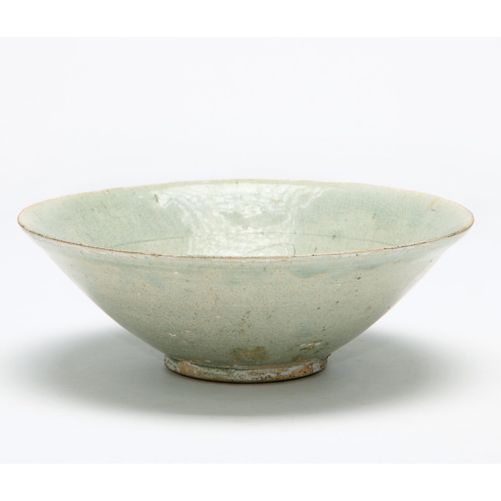 Appraisal: A Chinese Ying Ching Glazed Rice Bowl Song or Yuan