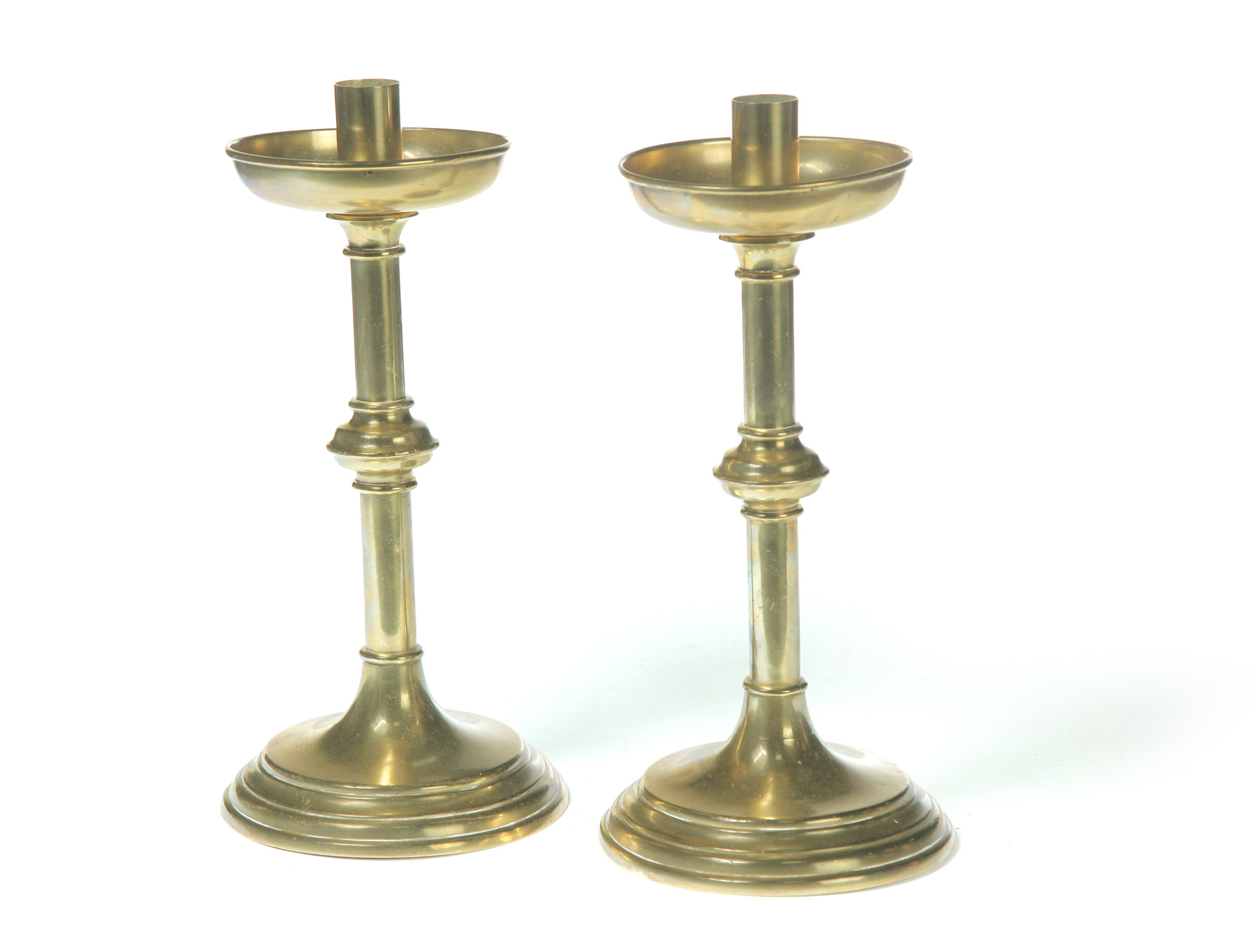 Appraisal: PAIR OF BRASS CANDLESTICKS American late th century Saucer shaped