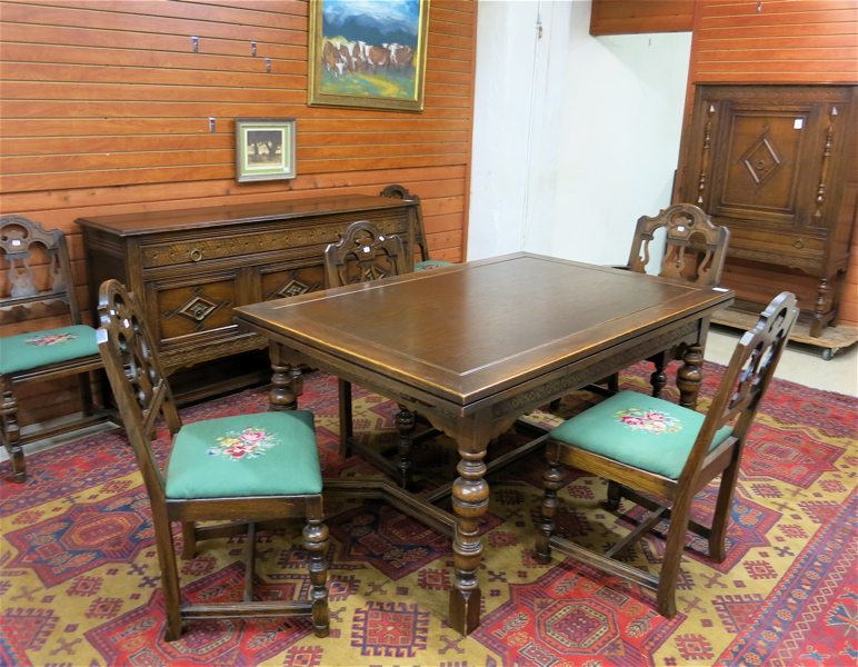 Appraisal: NINE-PIECE OAK DINING FURNITURE SET English Elizabethan Revival style American