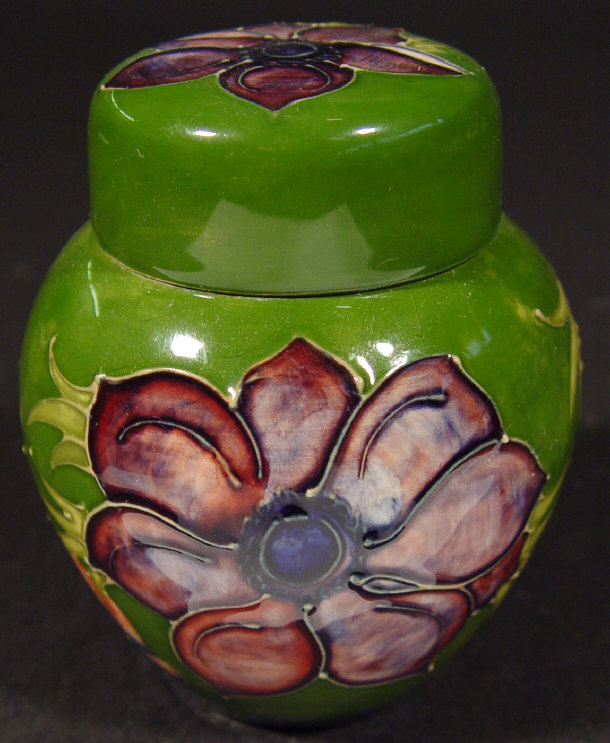 Appraisal: Small Moorcroft jar and cover hand painted and tubelined with