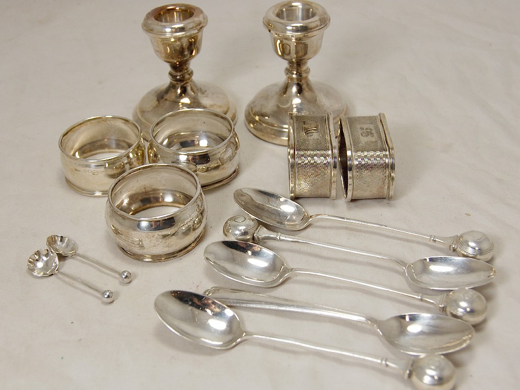 Appraisal: Pair of small silver dressing table candlesticks five napkin rings