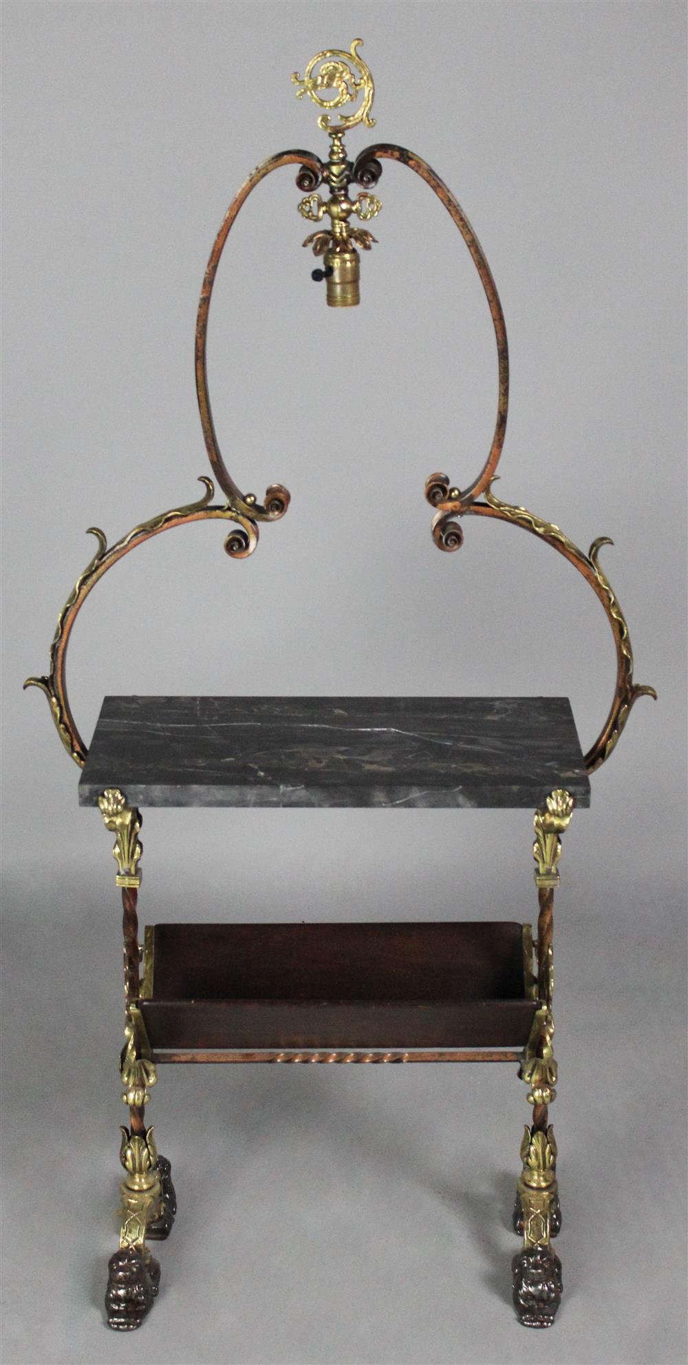 Appraisal: GILT METAL READING TABLE WITH LIGHT having an arching gilt