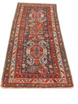 Appraisal: An Antique Kazak Runner A medallion runner with asymmetrical pattern