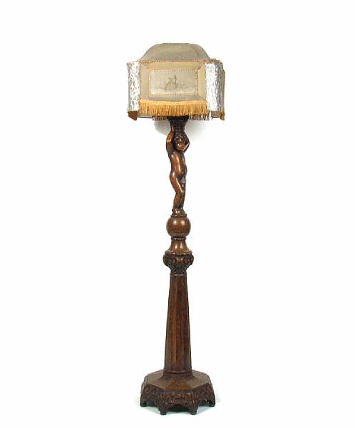 Appraisal: An oak figural lamp height ft in