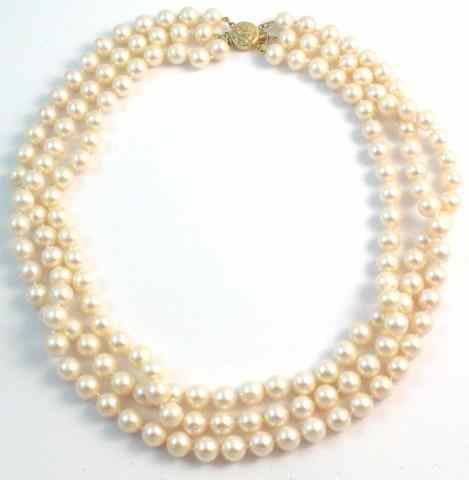 Appraisal: TRIPLE STRAND PEARL NECKLACE with three strands of well matched