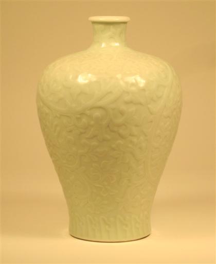 Appraisal: Chinese molded celadon glazed porcelain vasekangxi mark early th century