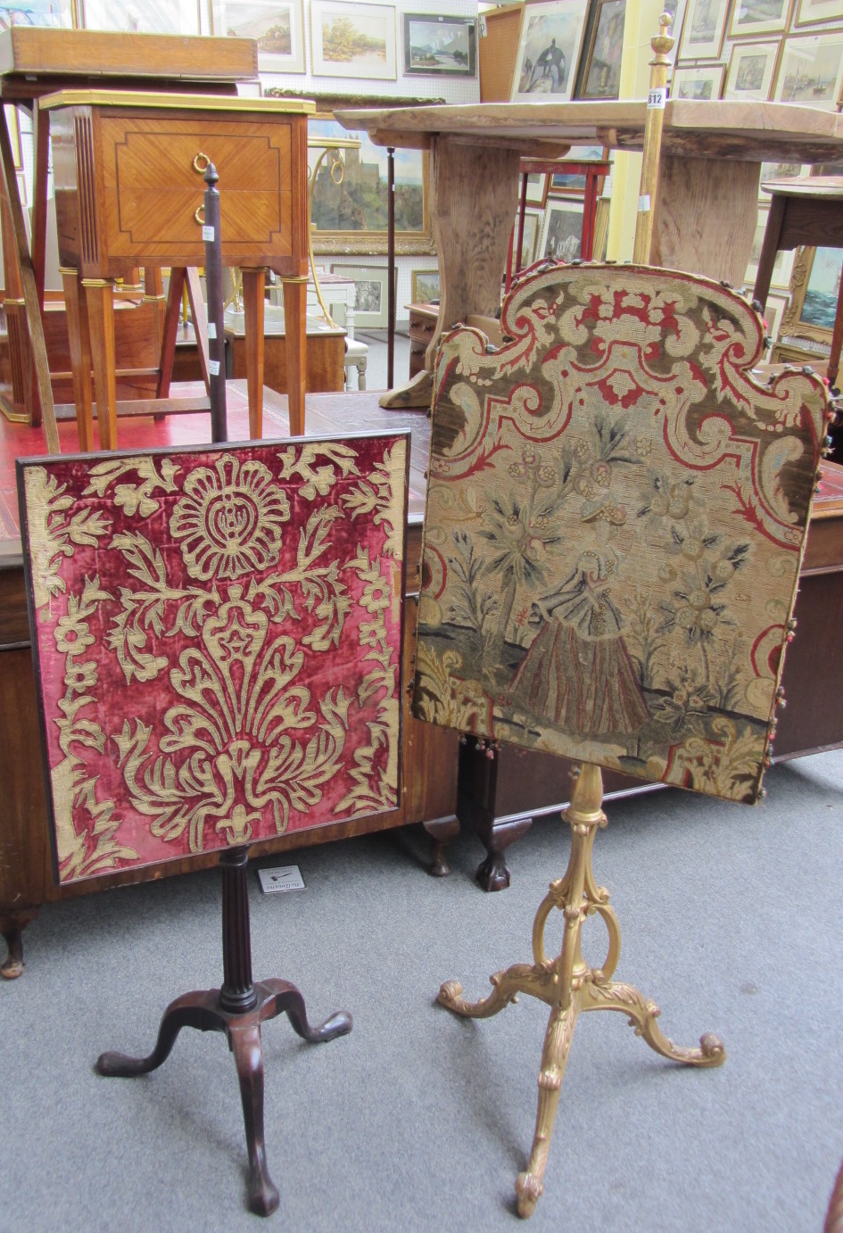 Appraisal: A th century giltwood pole screen with tapestry panel on