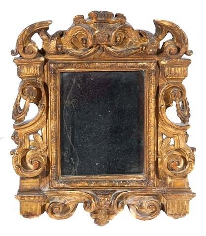 Appraisal: A TH CENTURY ITALIAN GILTWOOD WALL MIRROR the frame of