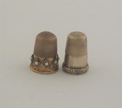 Appraisal: A late Victorian gold thimble set with a row of