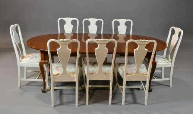 Appraisal: A CHIPPENDALE STYLE DINING SET WITH CHAIRSTo include an oblong