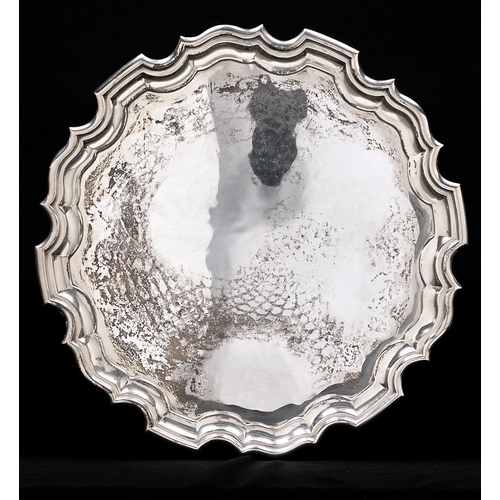 Appraisal: A George V silver salver on three leaf capped volute