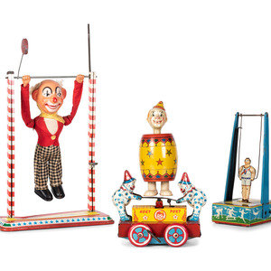 Appraisal: Four Tin Circus and Clown Toys American th Century comprising