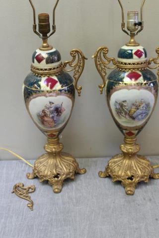 Appraisal: Pair of Vienna Gilt Metal Mounted PorcelainUrns From a Great