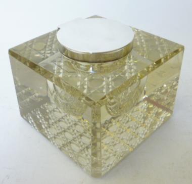 Appraisal: AN EDWARDIAN HEAVY CLEAR GLASS INKWELL WEIGHT maker J Grinsell