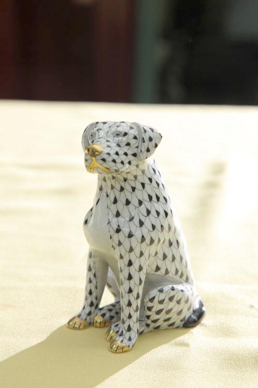 Appraisal: HEREND DOG A porcelain dog with black fishnet decoration h