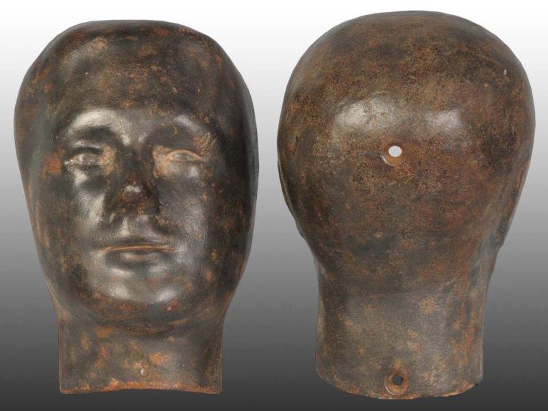 Appraisal: Cast Iron Mannequin Head in Two Pieces Description Circa Condition