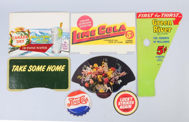 Appraisal: Lot Of Small Soda Advertising Signs This lot includes signs