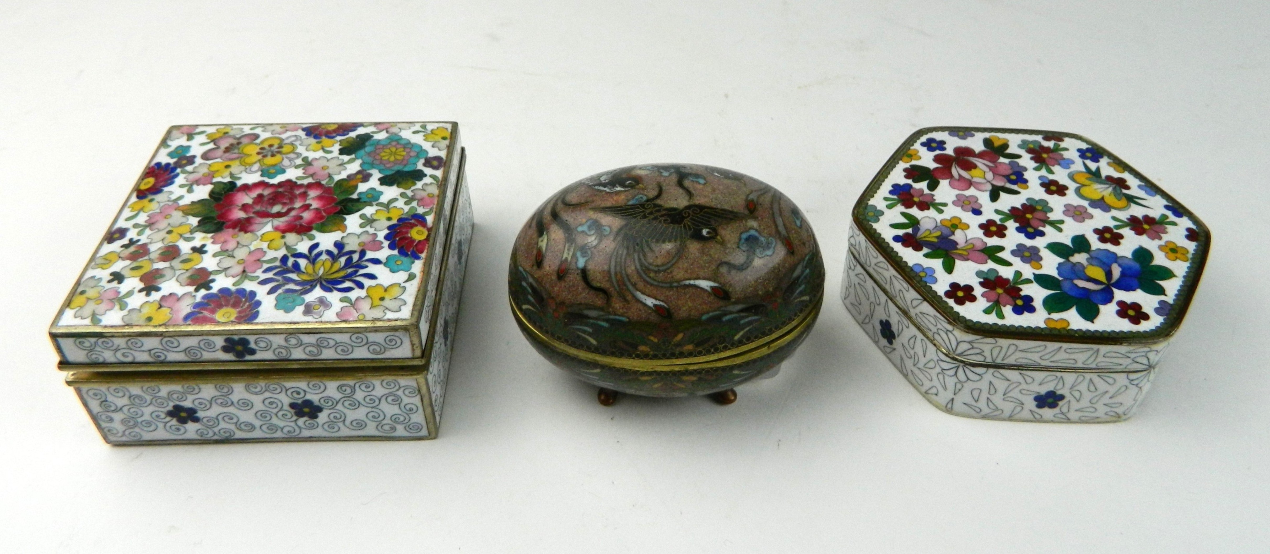 Appraisal: Japanese cloisonne boxes Oval shaped box- bird motif on pink